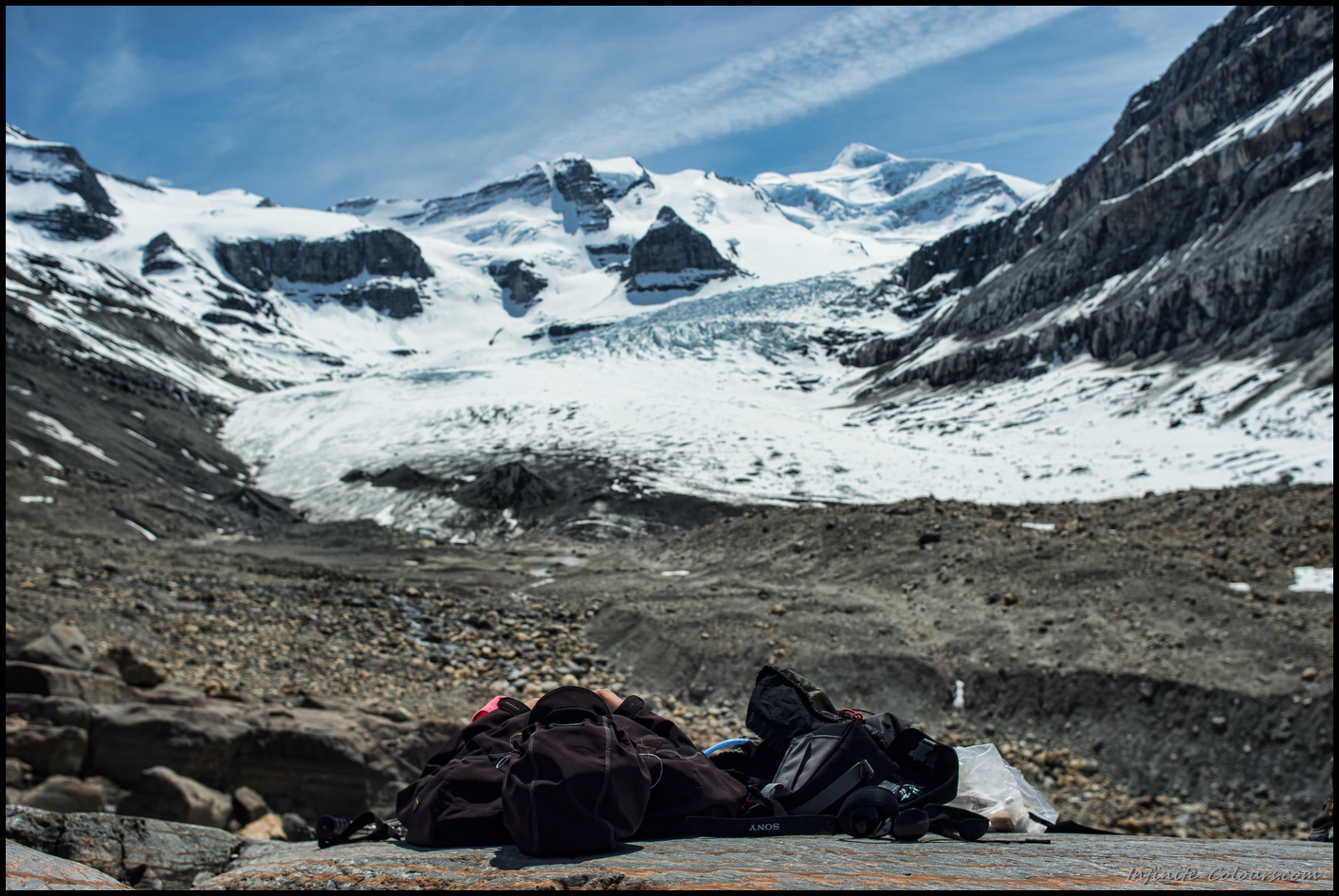 Taking a nap at the foot of Robson glacier, Berg Lake