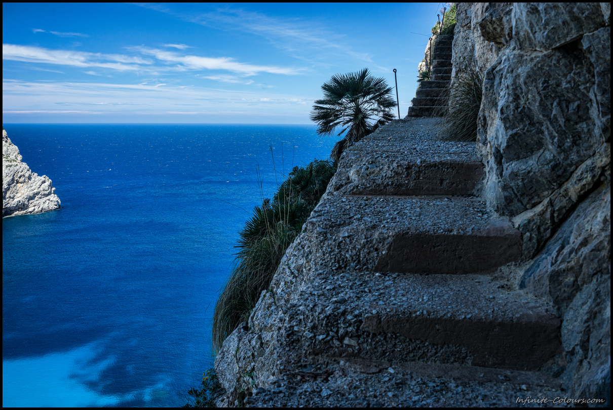 Quite exposed stone steps leading up the cliff over Cala Figuera