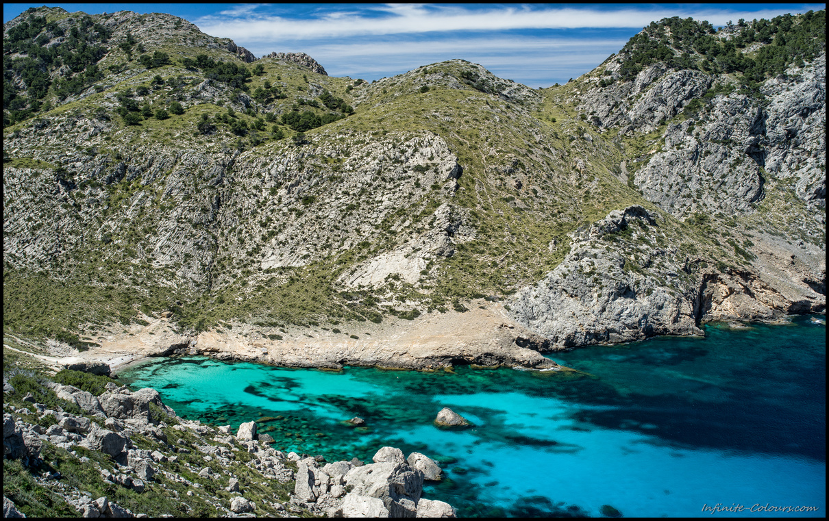 Shades of blue at Cala Figuera, is a stunning bay with turquoise waters