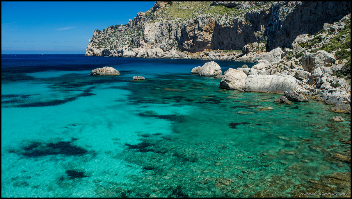 Shades of blue at Cala Figuera, is a stunning bay with turquoise waters